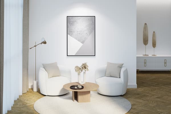 iStock Credit: gamespirit A pair of white modern swivel chairs in a living room